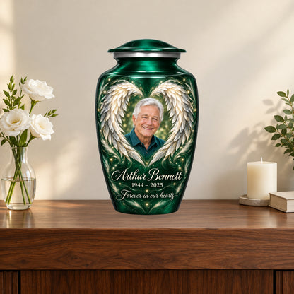 green personalized angel wings adult urn on a memorial console.