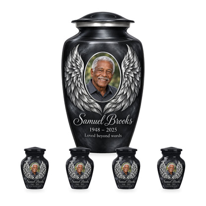 gray adult angel wings urn with four matching keepsakes shown in proportional 10-inch and 3-inch sizes.