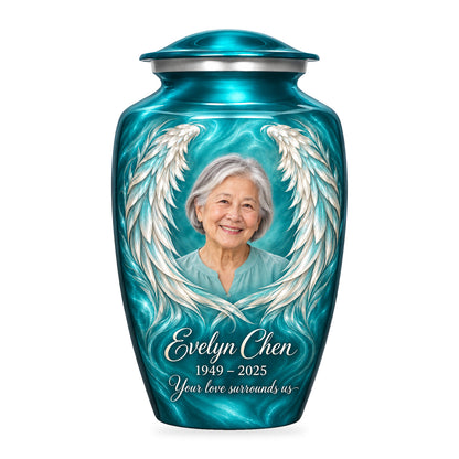 blue adult urn with Turquoise Pearl Wings angel wings artwork, fictional sample portrait and personalized inscription on white.
