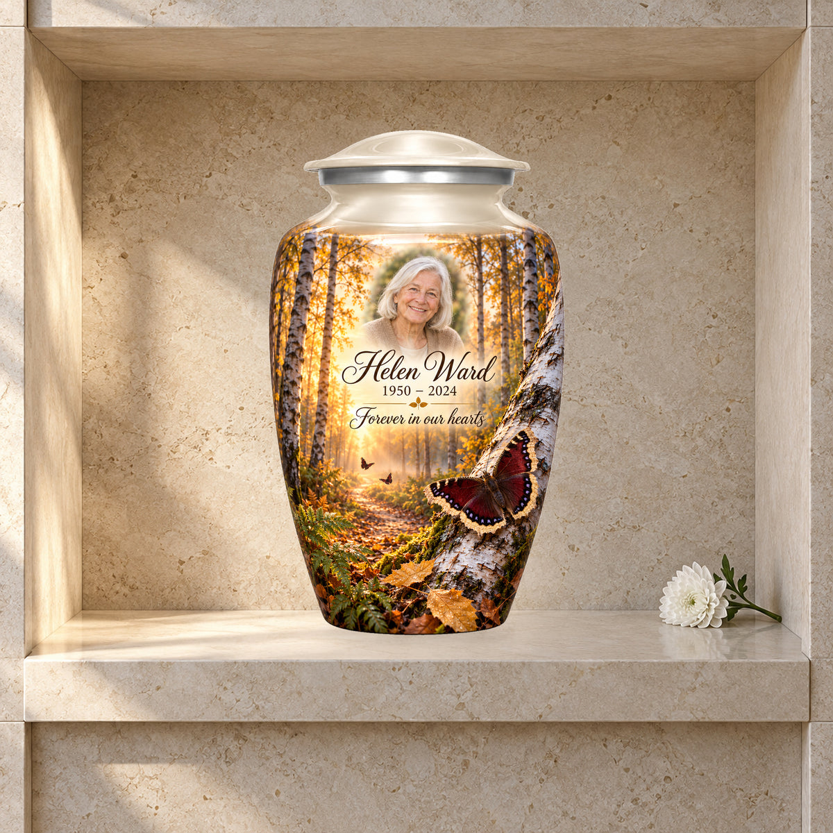 Birch Dawn adult butterfly urn in a styled columbarium display; decorative props are not included.