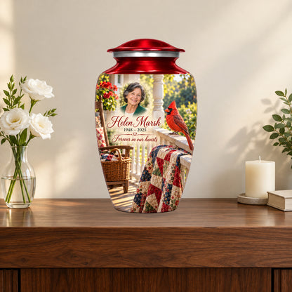 Quilt Porch Morning personalized cardinal urn in a styled memorial display; decorative props are not included.