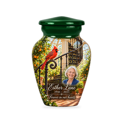 One ringless Orangery Spiral Stair cardinal keepsake urn with fictional sample portrait and text.