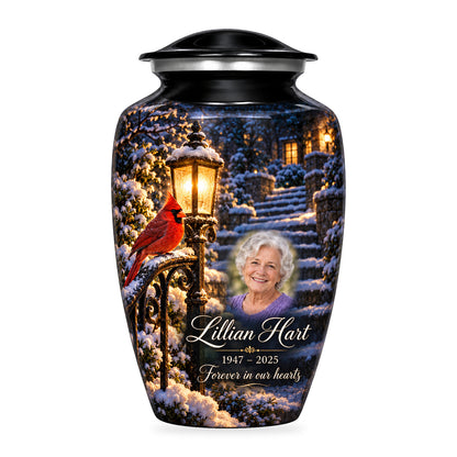 Black adult Lantern Snow Courtyard cardinal urn with fictional sample portrait, name and years, shown on white.