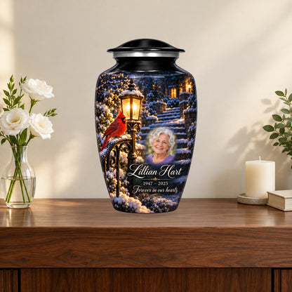 Lantern Snow Courtyard personalized cardinal urn in a styled memorial display; decorative props are not included.