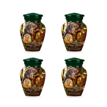 Four matching ringless Clockmaker Bench cat keepsake urns with fictional sample personalization.