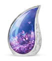 Large Butterfly urn with purple butterflies flying over a meadow design, ideal for adult female human ashes