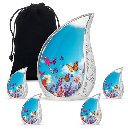 Bright Blue Butterfly Cremation Urn side profile showing urn shape - smooth teardrop contour featuring butterfly art - memorial set with one large and four small urns