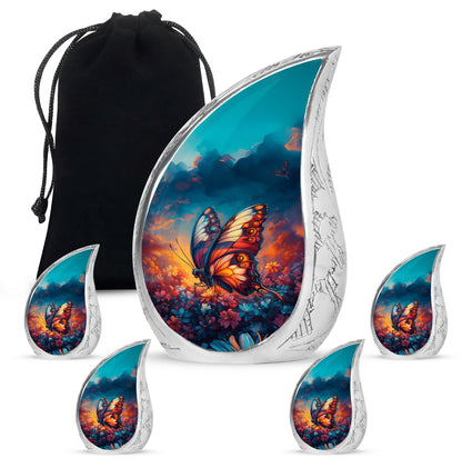 Sapphire Blue Butterfly Cremation Urn side profile showing urn shape - smooth teardrop contour featuring butterfly art - memorial set with one large and four small urns