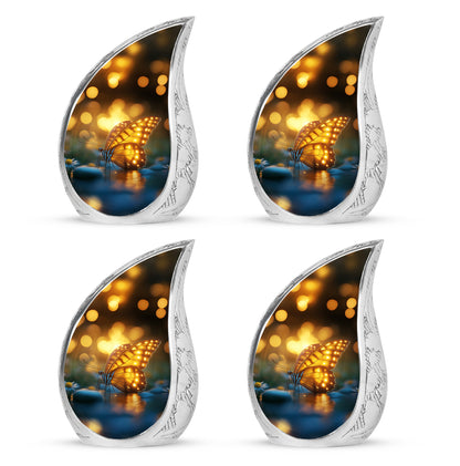Rich Black Butterfly Cremation Urn close-up of engraving and surface detail - rounded teardrop butterfly design with delicate detail - 10 inch aluminum urn for cremated remains