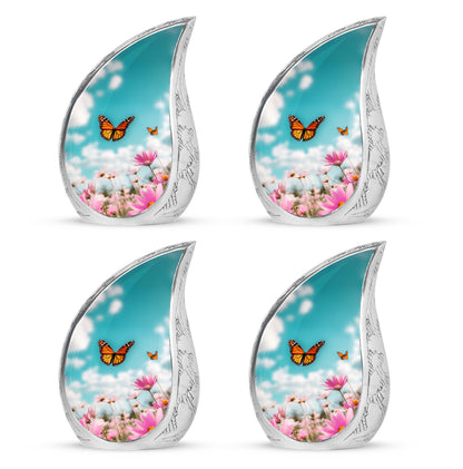 Soft Teal Butterfly Cremation Urn close-up of engraving and surface detail - flowing teardrop butterfly silhouette on curved aluminum - 10 inch aluminum urn for cremated remains