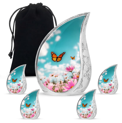 Deep Teal Butterfly Cremation Urn side profile showing urn shape - smooth teardrop contour featuring butterfly art - memorial set with one large and four small urns