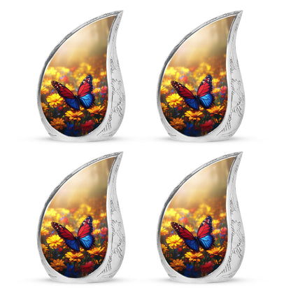 Champagne Gold Butterfly Cremation Urn close-up of engraving and surface detail - flowing teardrop butterfly silhouette on curved aluminum - 10 inch aluminum urn for cremated remains