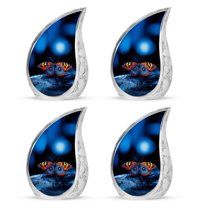 Dark Black Butterfly Cremation Urn close-up of engraving and surface detail - smooth teardrop contour featuring butterfly art - 10 inch aluminum urn for cremated remains