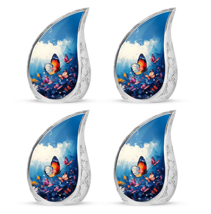 Bright Blue Butterfly Cremation Urn close-up of engraving and surface detail - smooth teardrop contour featuring butterfly art - 10 inch aluminum urn for cremated remains