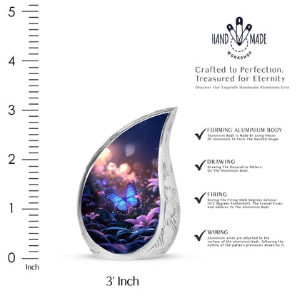 Petal Pink Butterfly Cremation Urn angled view of lid and engraved motif - graceful tear-shaped urn with butterfly motif - mini keepsake memorial for portion of cremation ashes