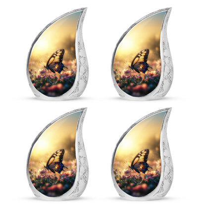 Royal Gold Butterfly Cremation Urn close-up of engraving and surface detail - graceful tear-shaped urn with butterfly motif - 10 inch aluminum urn for cremated remains
