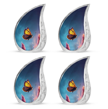 Slate Blue Butterfly Cremation Urn close-up of engraving and surface detail - flowing teardrop butterfly silhouette on curved aluminum - 10 inch aluminum urn for cremated remains