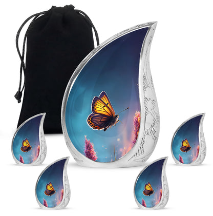 Bright Blue Butterfly Cremation Urn side profile showing urn shape - smooth teardrop contour featuring butterfly art - memorial set with one large and four small urns