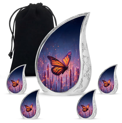Icy Blue Butterfly Cremation Urn side profile showing urn shape - rounded teardrop butterfly design with delicate detail - memorial set with one large and four small urns