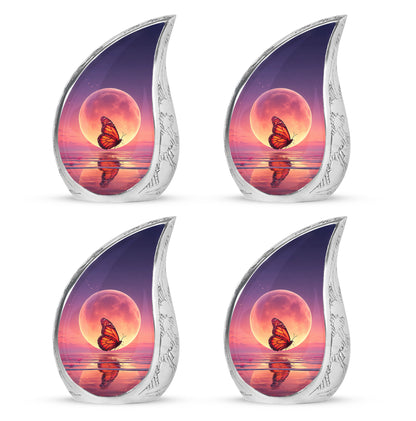Dusty Blue Butterfly Cremation Urn close-up of engraving and surface detail - flowing teardrop butterfly silhouette on curved aluminum - 10 inch aluminum urn for cremated remains