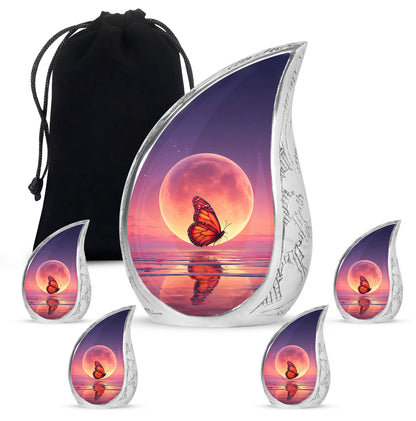 Celestial Blue Butterfly Cremation Urn side profile showing urn shape - rounded teardrop butterfly design with delicate detail - memorial set with one large and four small urns