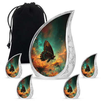 Cool Teal Butterfly Cremation Urn side profile showing urn shape - rounded teardrop butterfly design with delicate detail - memorial set with one large and four small urns
