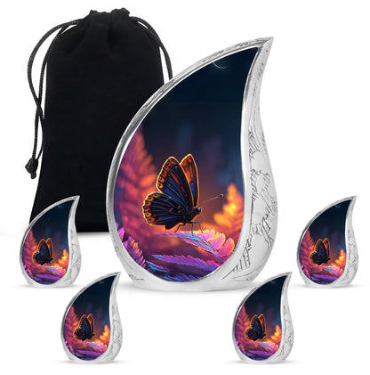 Navy Blue Butterfly Cremation Urn side profile showing urn shape - rounded teardrop butterfly design with delicate detail - memorial set with one large and four small urns