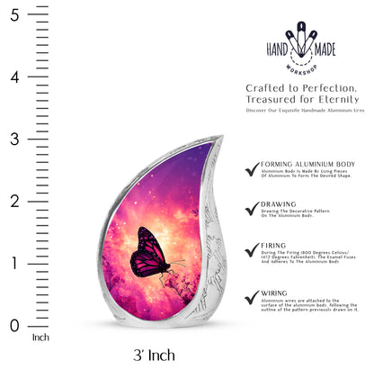 Coral Pink Butterfly Cremation Urn angled view of lid and engraved motif - rounded teardrop butterfly design with delicate detail - mini keepsake memorial for portion of cremation ashes