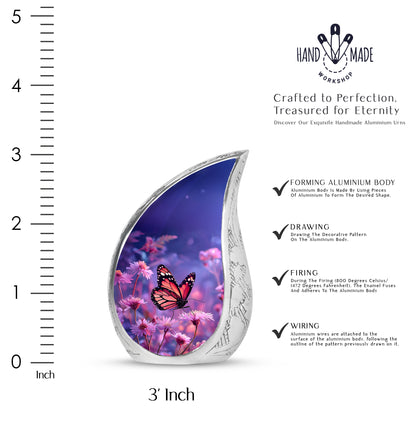 Serene Blue Butterfly Cremation Urn angled view of lid and engraved motif - smooth teardrop contour featuring butterfly art - mini keepsake memorial for portion of cremation ashes