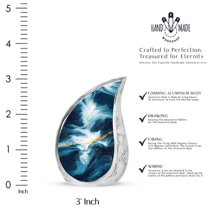 Sky Blue Blue Cremation Urn angled view of lid and engraved motif - flowing teardrop blue silhouette on curved aluminum - mini keepsake memorial for portion of cremation ashes