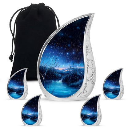 Rich Black Blue Cremation Urn side profile showing urn shape - rounded teardrop blue design with delicate detail - memorial set with one large and four small urns