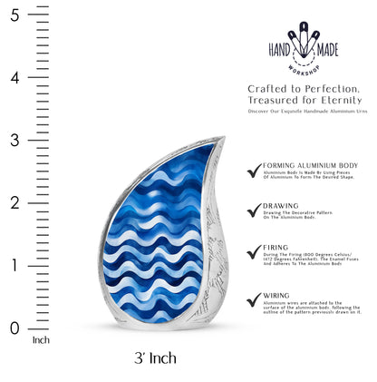Indigo Blue Cremation Urn angled view of lid and engraved motif - rounded teardrop blue design with delicate detail - mini keepsake memorial for portion of cremation ashes