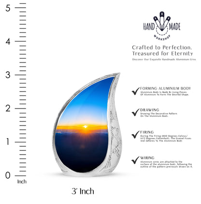 Cornflower Blue Blue Cremation Urn angled view of lid and engraved motif - smooth teardrop contour featuring blue art - mini keepsake memorial for portion of cremation ashes