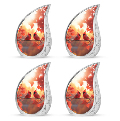 Sunrise Gold Cardinal Cremation Urn close-up of engraving and surface detail - rounded teardrop cardinal design with delicate detail - 10 inch aluminum urn for cremated remains