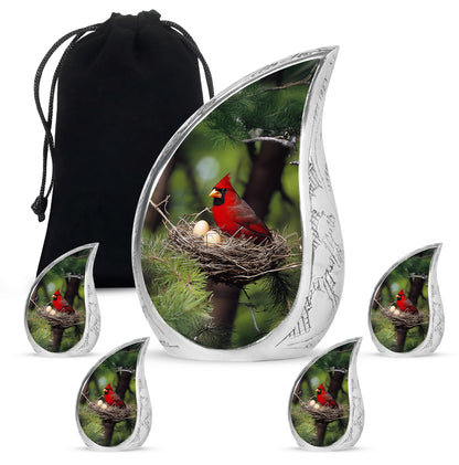 Jade Green Cardinal Cremation Urn side profile showing urn shape - flowing teardrop cardinal silhouette on curved aluminum - memorial set with one large and four small urns