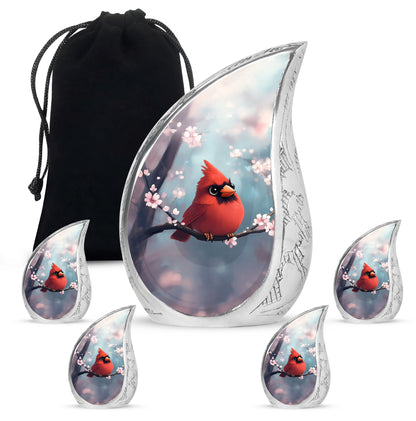 Ocean Teal Cardinal Cremation Urn side profile showing urn shape - flowing teardrop cardinal silhouette on curved aluminum - memorial set with one large and four small urns
