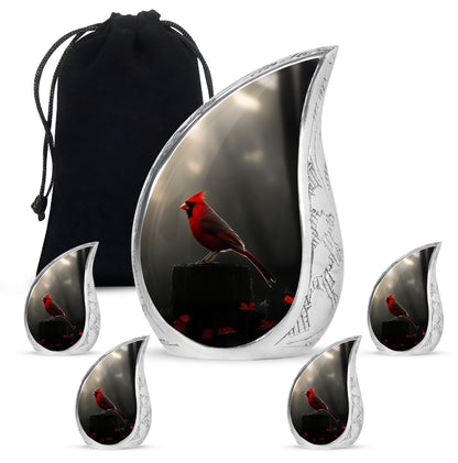 Jet Black Cardinal Cremation Urn side profile showing urn shape - flowing teardrop cardinal silhouette on curved aluminum - memorial set with one large and four small urns