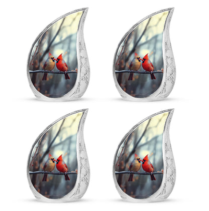 Pewter Gray Cardinal Cremation Urn close-up of engraving and surface detail - flowing teardrop cardinal silhouette on curved aluminum - 10 inch aluminum urn for cremated remains