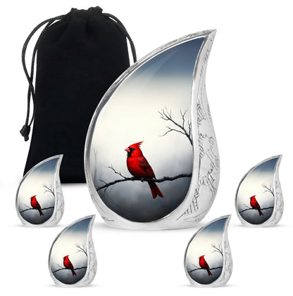 Frosted Silver Cardinal Cremation Urn side profile showing urn shape - smooth teardrop contour featuring cardinal art - memorial set with one large and four small urns