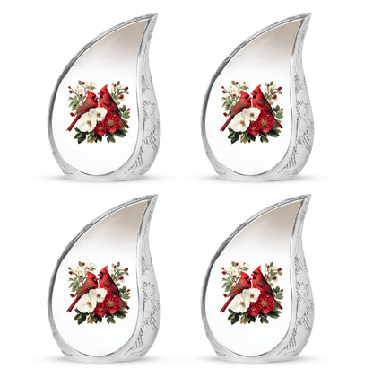 Polished Silver Cardinal Cremation Urn close-up of engraving and surface detail - graceful tear-shaped urn with cardinal motif - 10 inch aluminum urn for cremated remains