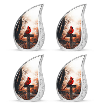 Champagne Gold Cardinal Cremation Urn close-up of engraving and surface detail - flowing teardrop cardinal silhouette on curved aluminum - 10 inch aluminum urn for cremated remains