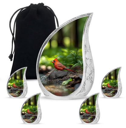 Sage Green Cardinal Cremation Urn side profile showing urn shape - rounded teardrop cardinal design with delicate detail - memorial set with one large and four small urns