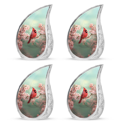 Sage Green Cardinal Cremation Urn close-up of engraving and surface detail - flowing teardrop cardinal silhouette on curved aluminum - 10 inch aluminum urn for cremated remains