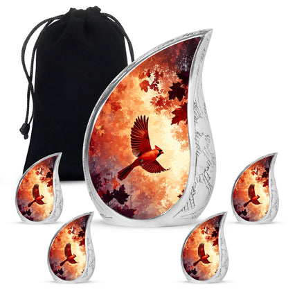 Ruby Red Cardinal Cremation Urn side profile showing urn shape - smooth teardrop contour featuring cardinal art - memorial set with one large and four small urns