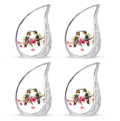 Satin Silver Hummingbird Cremation Urn close-up of engraving and surface detail - flowing teardrop hummingbird silhouette on curved aluminum - 10 inch aluminum urn for cremated remains