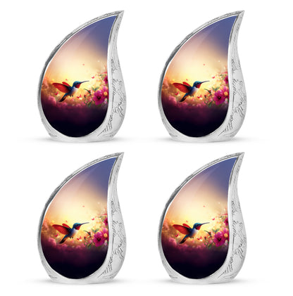 Champagne Gold Hummingbird Cremation Urn close-up of engraving and surface detail - flowing teardrop hummingbird silhouette on curved aluminum - 10 inch aluminum urn for cremated remains