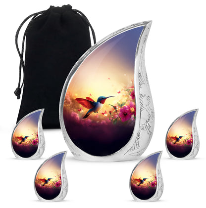 Sunrise Gold Hummingbird Cremation Urn side profile showing urn shape - flowing teardrop hummingbird silhouette on curved aluminum - memorial set with one large and four small urns