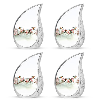 Polished Silver Hummingbird Cremation Urn close-up of engraving and surface detail - smooth teardrop contour featuring hummingbird art - 10 inch aluminum urn for cremated remains