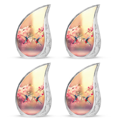 Antique Gold Hummingbird Cremation Urn close-up of engraving and surface detail - rounded teardrop hummingbird design with delicate detail - 10 inch aluminum urn for cremated remains