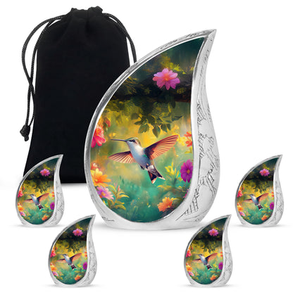 Jet Black Hummingbird Cremation Urn side profile showing urn shape - rounded teardrop hummingbird design with delicate detail - memorial set with one large and four small urns